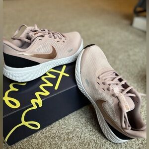 Nike running shoes size 6.5 rose gold/pink